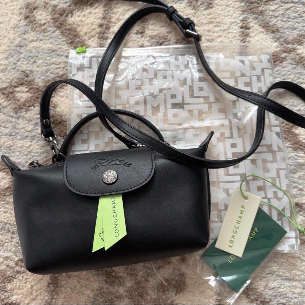 Longchamp Le Pliage Xtra XS Pouch in black leather.